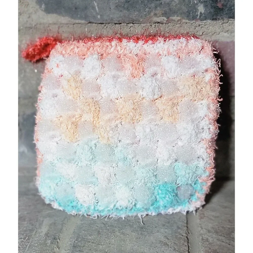 Sea foam green and coral shower scrubby